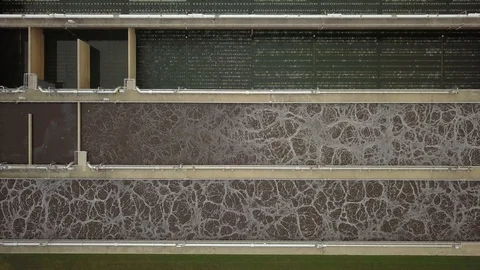 Low altitude drone flight over a sewage treatment plant. Stock Footage 94705842