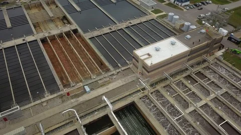 Low altitude drone flight over a sewage treatment plant. Stock Footage 94705883