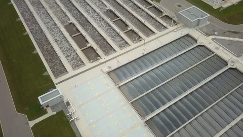 Low altitude drone flight over a sewage treatment plant. Stock Footage 94706168
