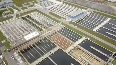 Low altitude drone flight over a sewage treatment plant. Stock Footage 94706301