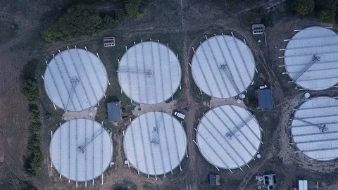 Low altitude drone flight over a sewage treatment plant. Stock Footage 103184714