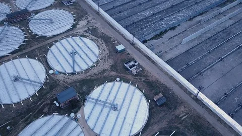 Low altitude drone flight over a sewage treatment plant. Stock Footage 103185098