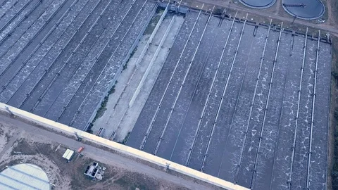 Low altitude drone flight over a sewage treatment plant. Video stock 103185117