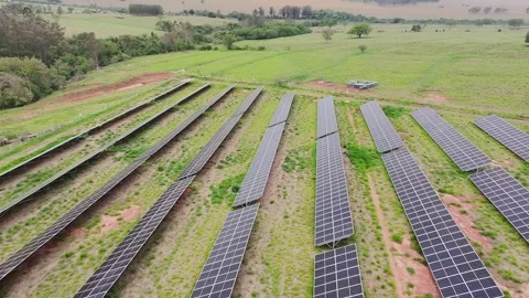Low Altitude Drone Flight Over a Solar Power Plant Showing Its Full Extension Stock Footage 319603998
