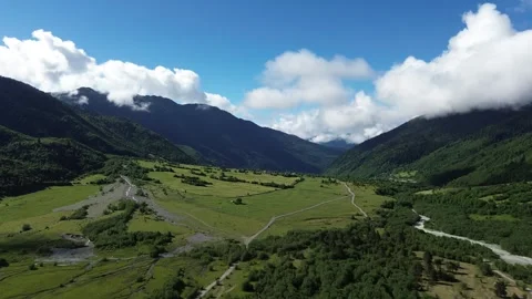 Low Altitude Drone Flight Over Becho Valley Meadow And River 4K RAW Stock Footage 339737080