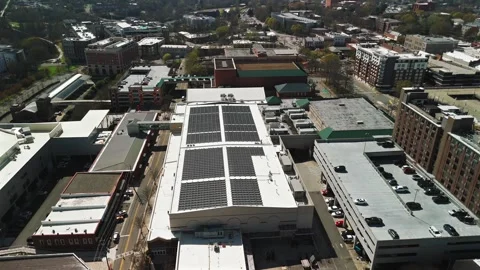 Low Altitude Drone Over Rooftop Solar Array, Downtown Atascadero California Stock Footage 337030830