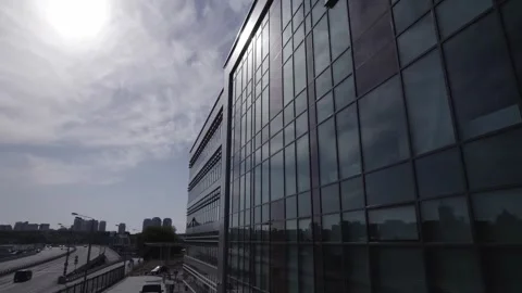 Low altitude drone tracking office building Stock Footage 329637640