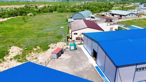 Low Altitude Drone View of Modern Warehouse Buildings and Logistics Facility Stock Footage 340041439