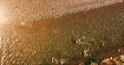 Low altitude flight over fresh fast mountain river with rocks at sunny summer Stock Footage 291783984