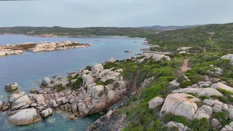 Low Altitude Forward Drone Passing Coastal Rocks Sardegna Stock Footage 333693943