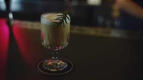Low and high angle close up of mint cold modern cocktail of whiskey, milk and to Stock Footage 102296766