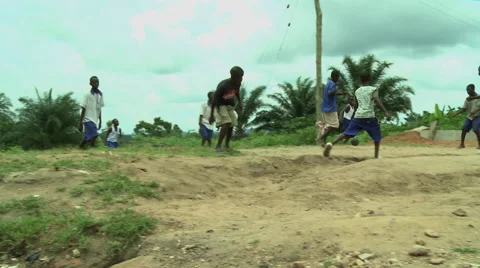 LOW ANGLE: ADEISO STUDENTS PLAYING SOCCER Stock Footage 58070204