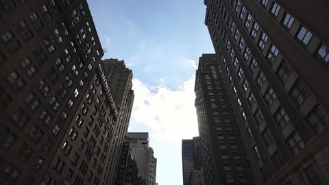 Low angle aerial drone shot of NYC New York City Manhattan skyscraper buildings Stock Footage 96518052