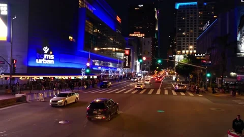 Low angle aerial drone shot. Street downtown Los Angeles at night Staples center Stock Footage 131493320