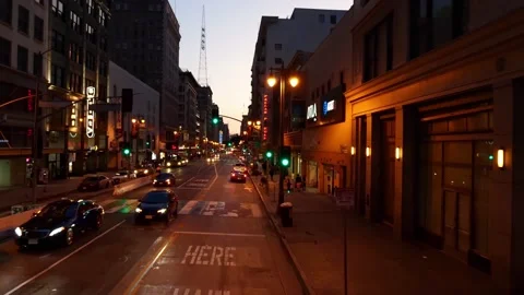 Low angle aerial drone view of downtown Los Angeles street. LA night urban life Stock Footage 131491764