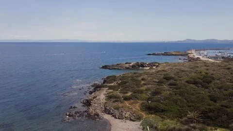 Low angle aerial view of rocky coast, Rocks in the sea Stock Footage 106187915