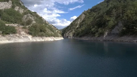 Low angle Aerial view of San Domenico lake Stock Footage 99056141
