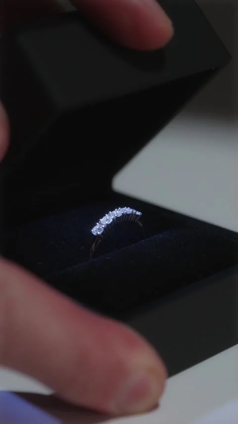 Low angle aesthetic shot of a luxury diamond ring in premium box Stock Footage 334549369