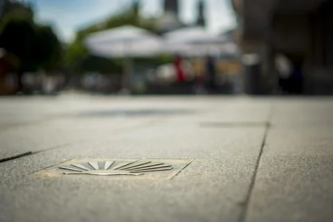 Low angle and selective focus shot of the Camino Santiago St James's shell .. Stock Photos