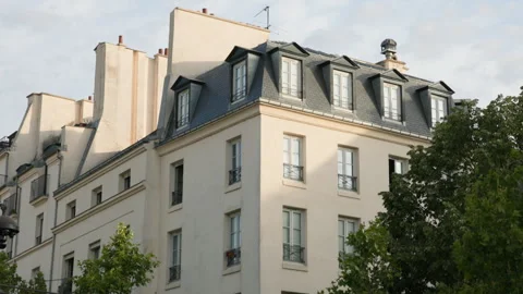 Low-angle architectural view of a classic Parisian Haussmann building corner, sh Stock Footage 338007394