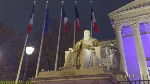 Low Angle Of Assemblée Nationale Statue And French Flags At Night Paris, France Stock Footage 323804263