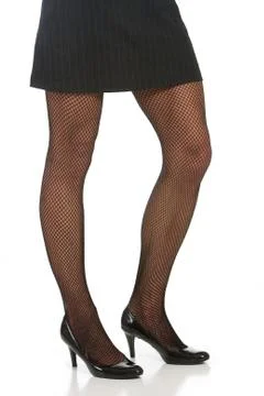Low angle of athletic looking sexy legs of woman. shot against white backgrou Foto stock