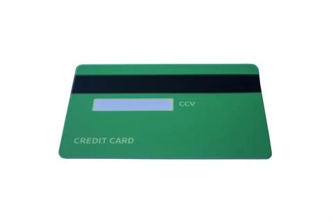 Low-angle back view of a green credit card with magnetic stripe and CCV pan.. 写真素材