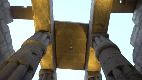 Low angle between uplight columns and ceiling details of Luxor temple Egypt Stock Footage 139633575