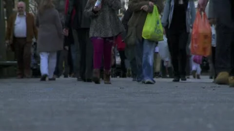 Low angle of busy feet on a high street Stock Footage 10792647