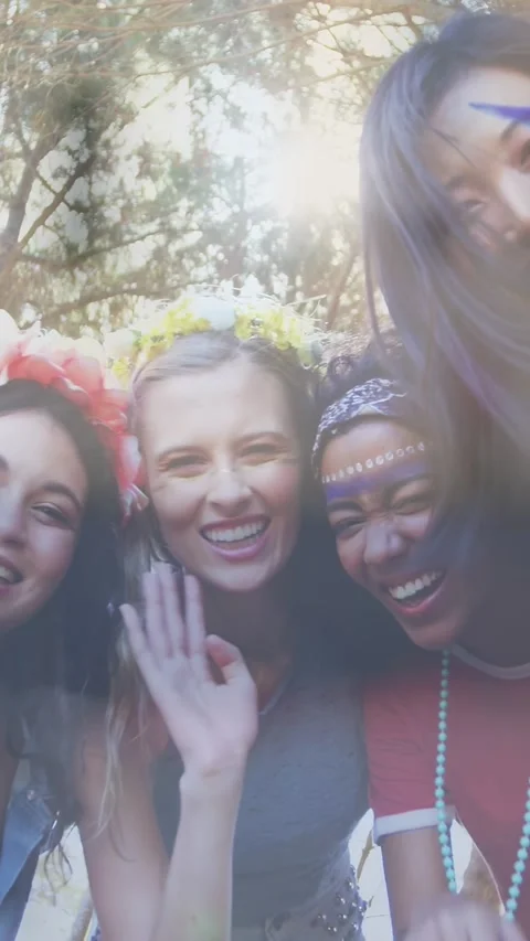 Low-angle camera causing lean, 4 women laughing, waving, animated overlays on Stock Footage 330273330
