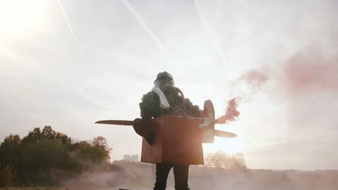 Low angle camera follows beautiful excited little girl running in fun plane Stock Footage 99771750