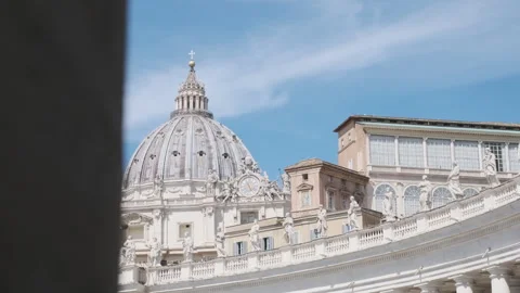 Low angle camera revealing the dome of St. Peter's Basilica in Vatican City Stock Footage 244069473