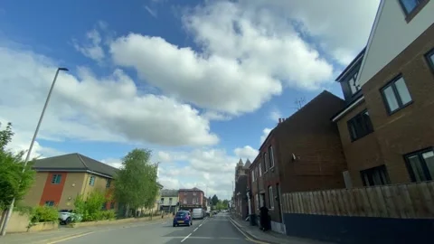 Low Angle Car Mounted Camera Luton City Street View Footage Video stock 314413886