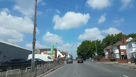 Low Angle Car Mounted Camera Luton City Street View Footage Video stock 314417263