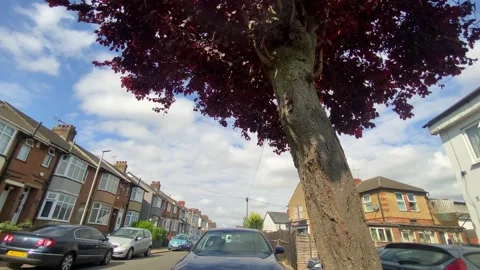 Low Angle Car Mounted Camera Luton City Street View Footage Video stock 314418588