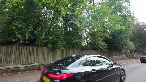 Low Angle Car Mounted Camera Luton City Street View Footage Stock Footage 314420031