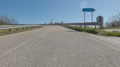 Low-Angle Car POV Driving on a Quiet Road in Rionero Sannitico, Italy 動画素材 332428982