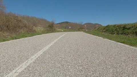 Low-Angle Car POV Driving on a Quiet Road in Rionero Sannitico, Italy 動画素材 332429047