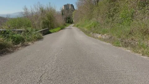 Low-Angle Car POV Driving Towards Pandone Castle in Cerro al Volturno, Italy Vídeos de archivo 332429393