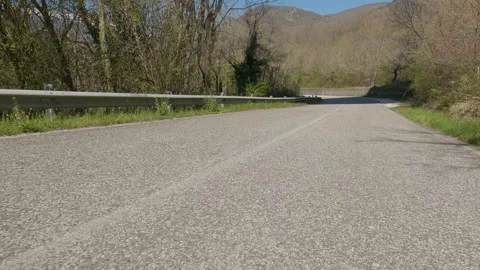 Low-Angle Car POV Driving Out of Cerro al Volturno Towards Countryside, Italy Vidéo 332429627