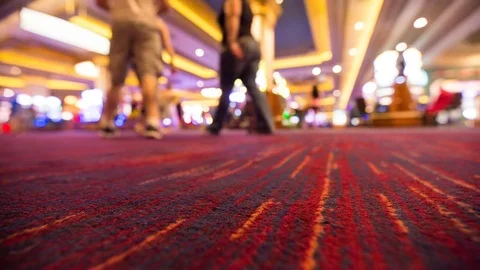 Low Angle Casino Floor Carpet People Walking Video stock 79537533