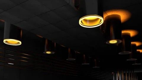 Low Angle Ceiling of Cylinder Lamps Igniting with Gold Rings Stock Footage 346780774