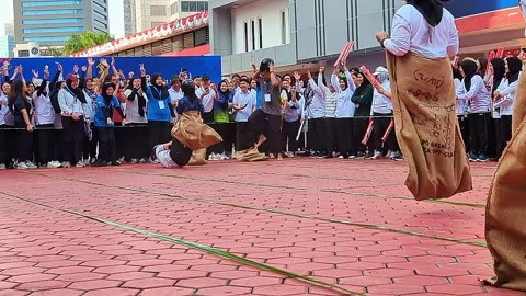 Low angle cinematic shot. The sack race competition Stock Footage 315372758