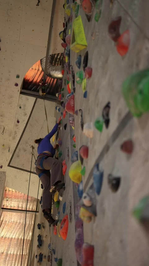 Low angle climbing practice indoors Stock Footage 339287709