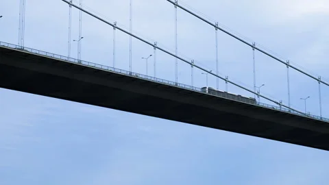 Low angle close up of cable-stayed bridge with flow of cars Stock Footage 253575180