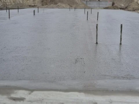 Low Angle Close-up of Freshly Poured and Smoothed Wet Concrete Stock Photos