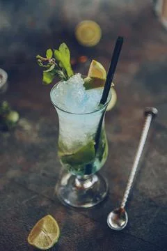 Low angle close up of ice cold modern gourmet craft cocktail of gin Stock Photos