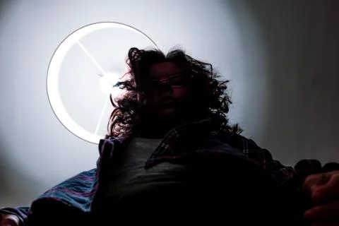 A low angle close-up shot of an unrecognizable young Caucasian redhead woman  Stock Photos