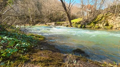 Low Angle Close-Up of Turquoise River With White Foam Video stock 330941726