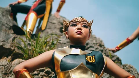 Low Angle Close Ups of Female Warriors Posing on Rocks Stock Footage 260592318